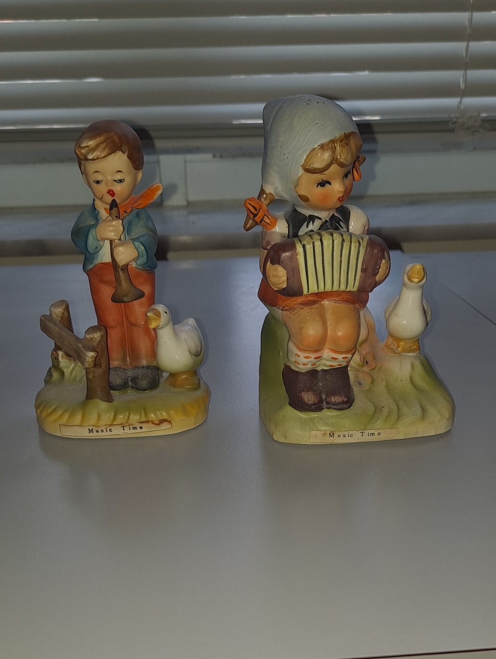 Hand-Painted Music Time Ceramic Figurine Pair in Blue, Orange, Cream
